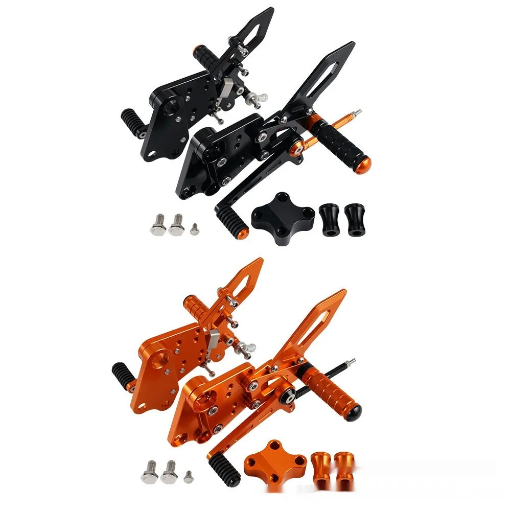KTM Duke foot pedal bracket assembly for raised rear shift pedal in black or orange