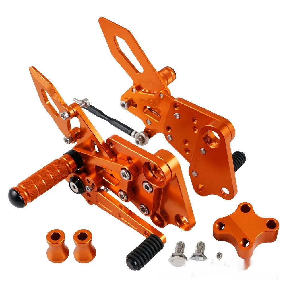 KTM Duke foot pedal bracket assembly for raised rear shift pedal in black or orange