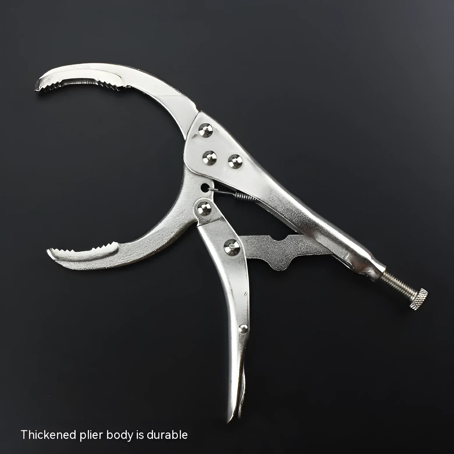 Adjustable clamp oil filter wrench with 50-110mm range on a workshop bench