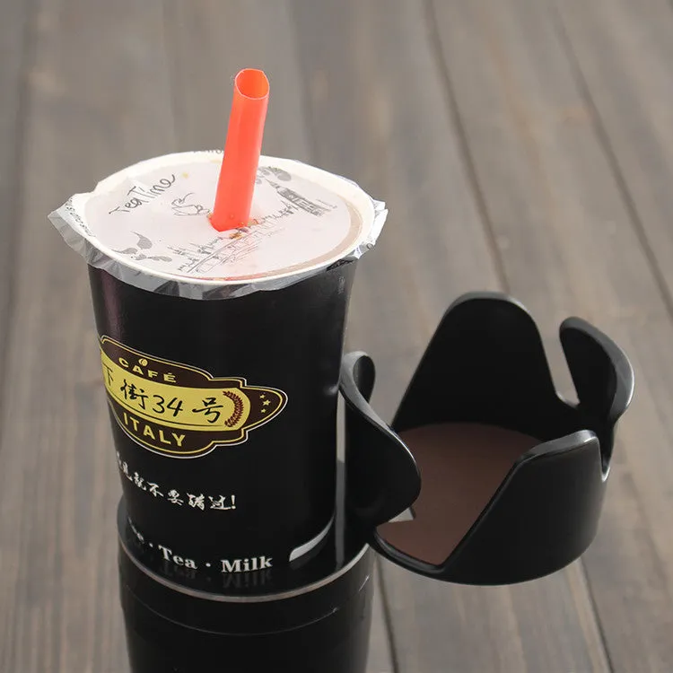 Car multifunctional cup holder and navigation mount organiser in black, brown, pink, green, or blue colours.