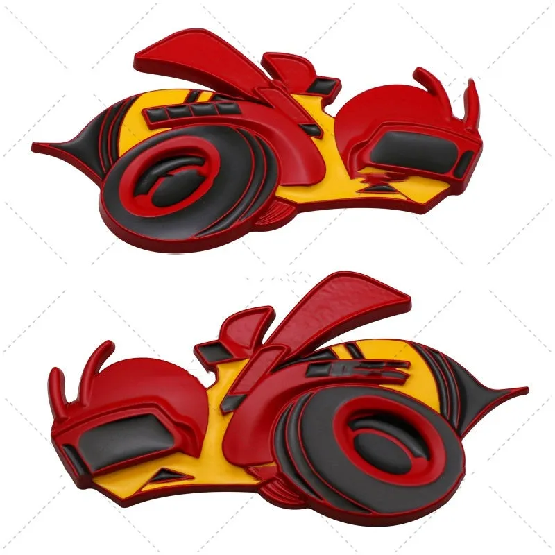 Pair of large yellow and silver Big Bee zinc alloy bumper stickers on a car bumper.