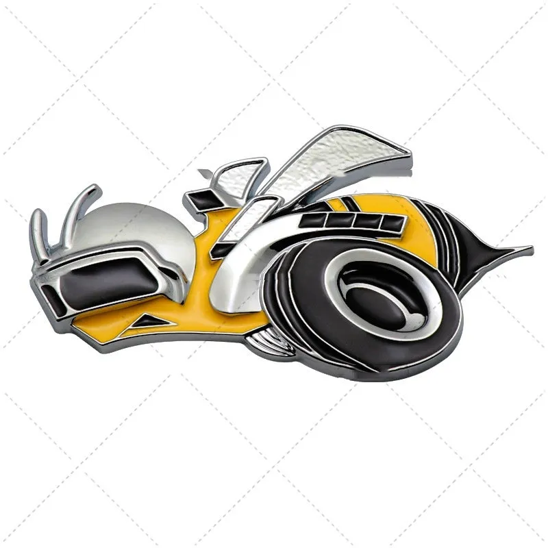 Pair of large yellow and silver Big Bee zinc alloy bumper stickers on a car bumper.