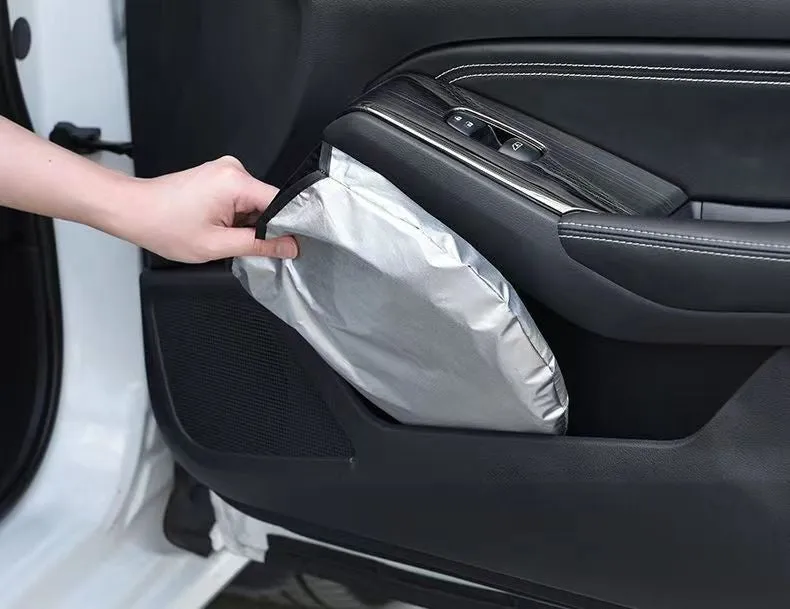 Aluminium foil car sunshade in titanium silver colour shown folded, with size options 140cmx70cm and 150cmx80cm.