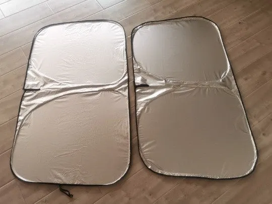 Aluminium foil car sunshade in titanium silver colour shown folded, with size options 140cmx70cm and 150cmx80cm.