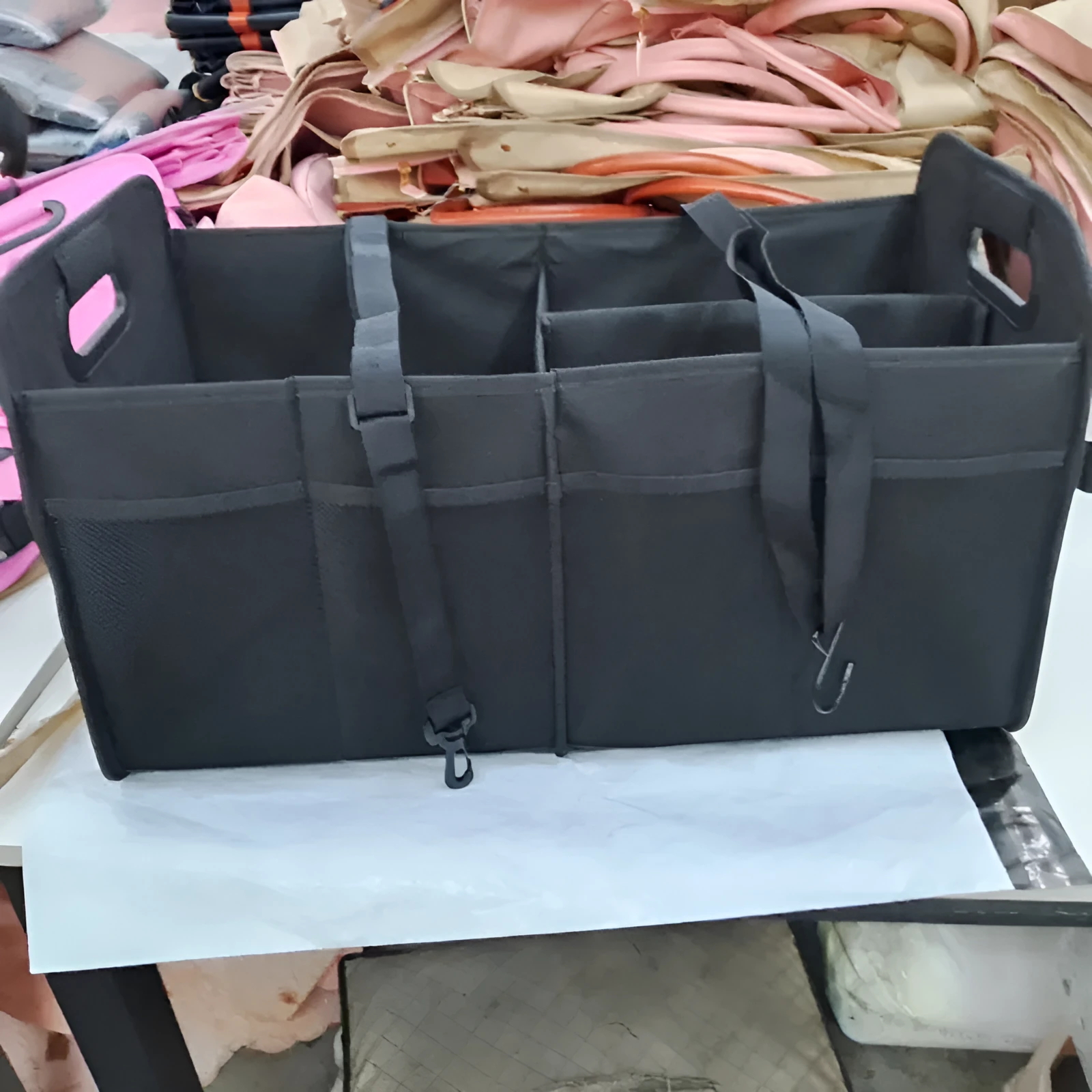 Black foldable fabric car boot storage box with handle and multiple compartments