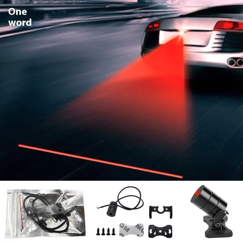 Motorcycle laser fog light unit with aluminium housing projecting star pattern on road surface.