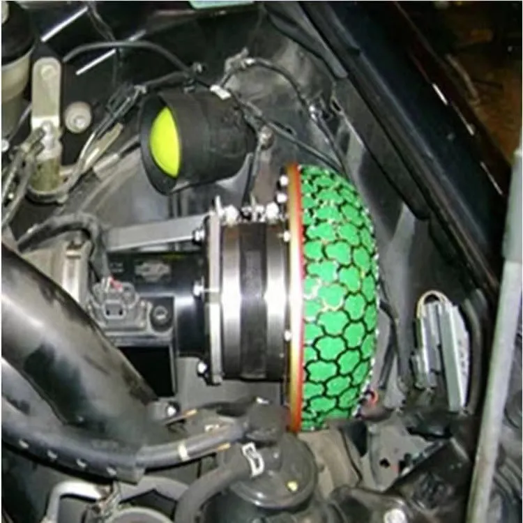 Aluminium mushroom air filter with coloured housing and washable sponge insert for car modification.