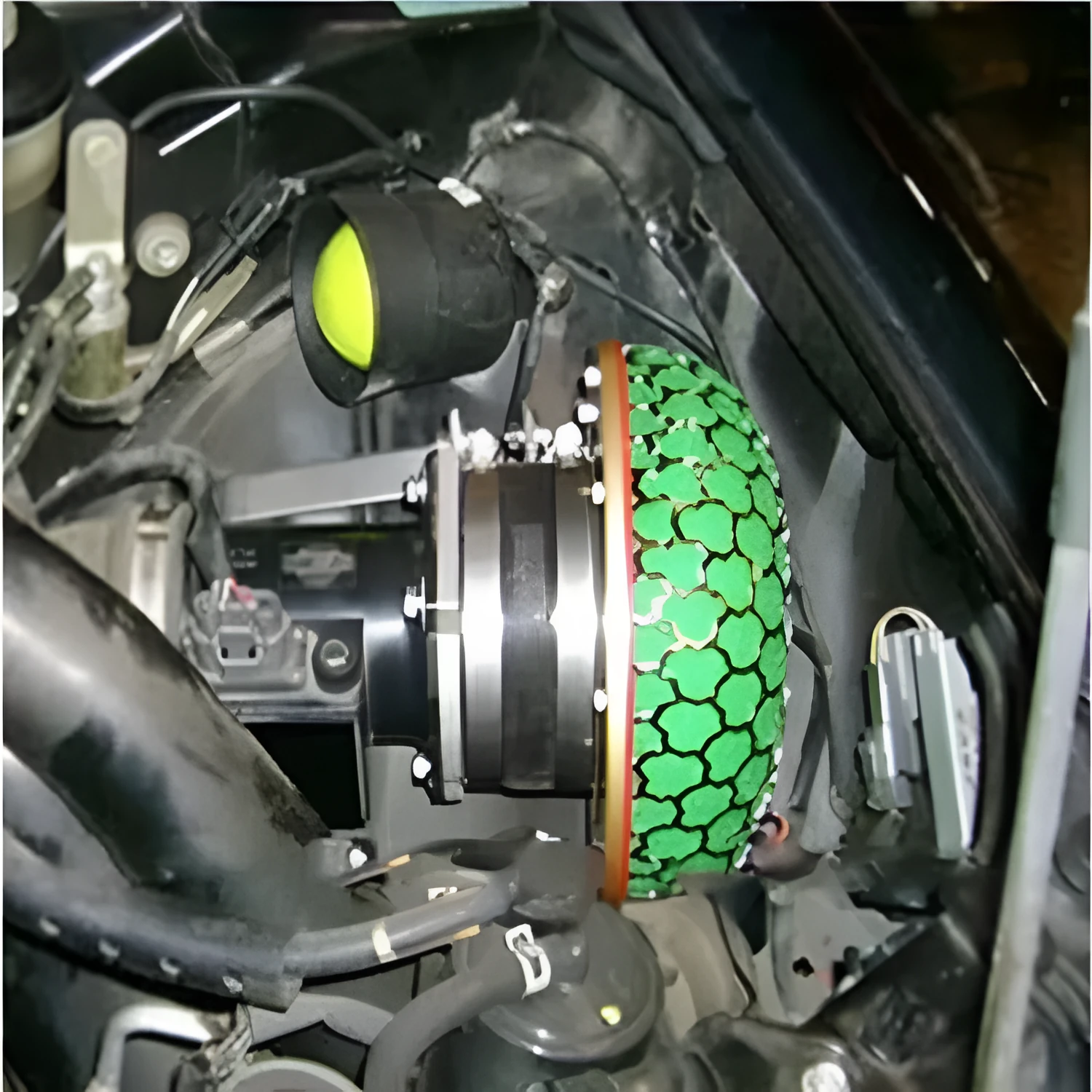 Aluminium mushroom air filter with coloured housing and washable sponge insert for car modification.