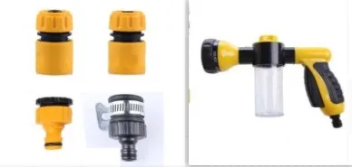 Green high-pressure foam spray gun for car washing with adjustable nozzle and attached water pipe.