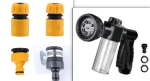 Green high-pressure foam spray gun for car washing with adjustable nozzle and attached water pipe.
