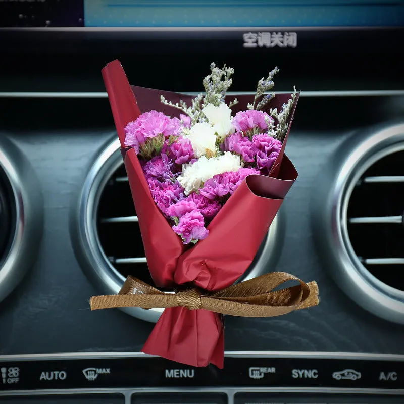 Car air conditioning vent clip with dried flower ornament and perfume bottle in various colour options