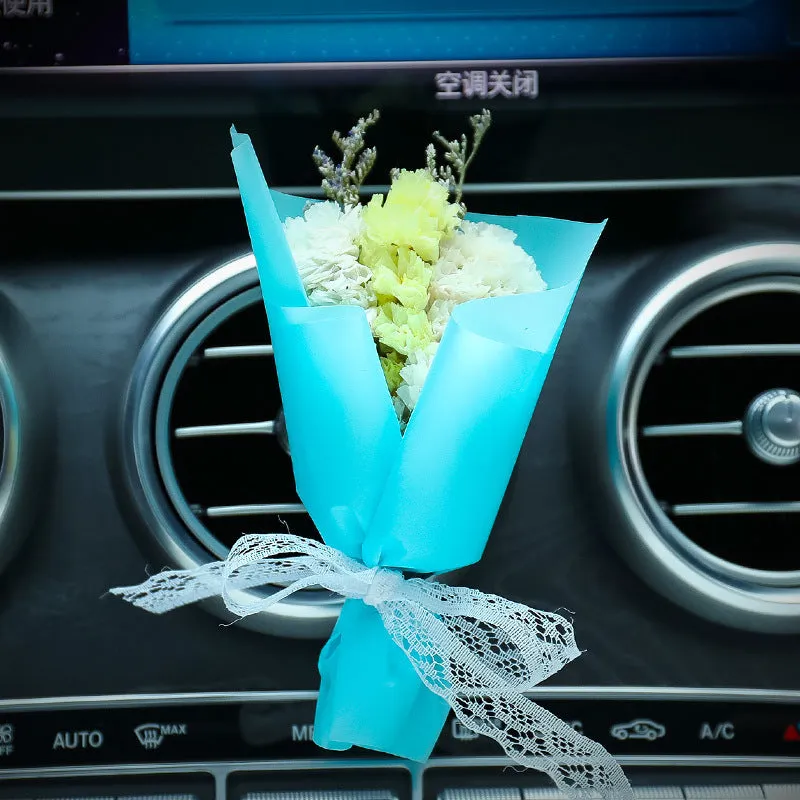 Car air conditioning vent clip with dried flower ornament and perfume bottle in various colour options