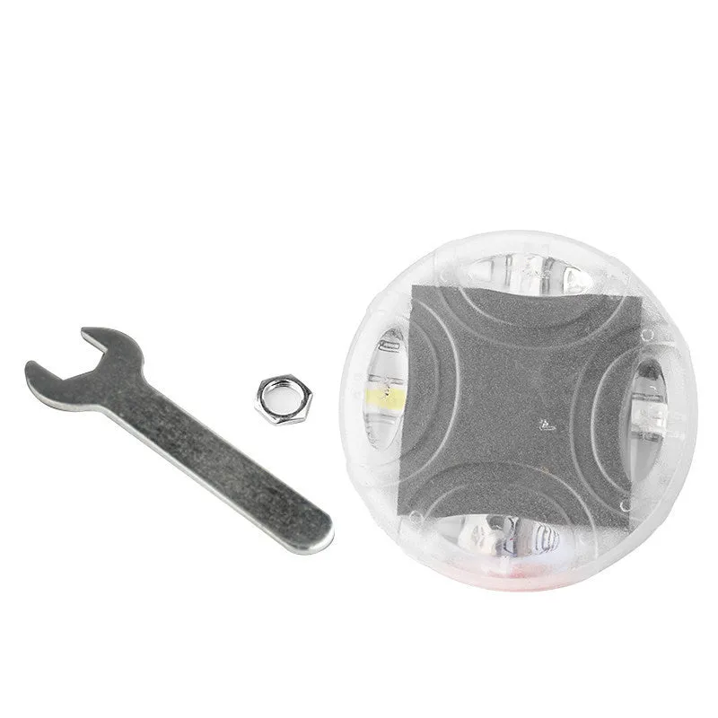 Colourful solar-powered LED hub decorative light for vehicle wheels, shown with installation screws.