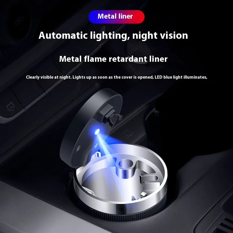 Metal ABS car ashtray with cover and blue LED light against a dark background