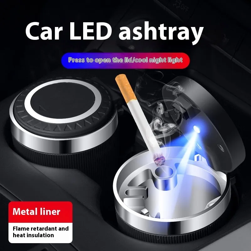 Metal ABS car ashtray with cover and blue LED light against a dark background