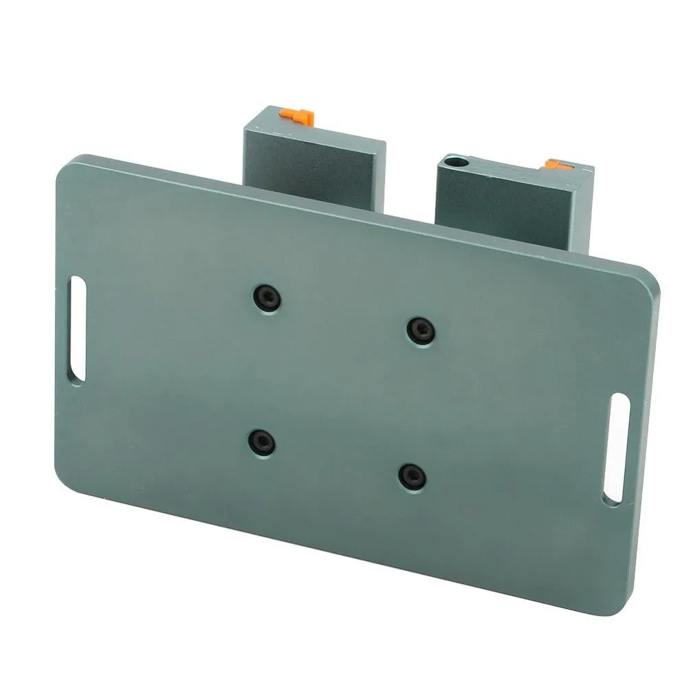 Mobile phone repair fixture with silicone grip and adjustable mechanism next to a demolition crowbar.