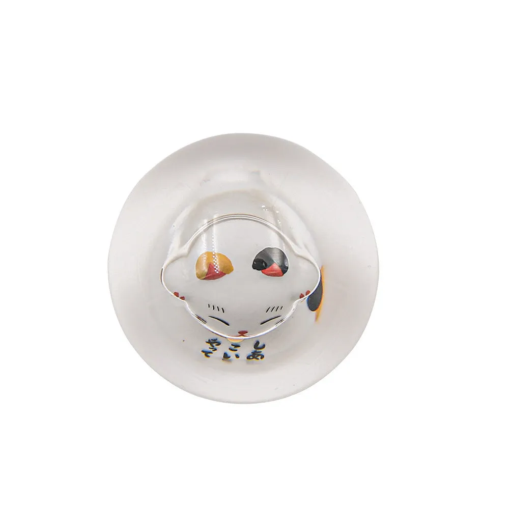JDM Lucky Cat acrylic gear head with three metal adapters on a grey background