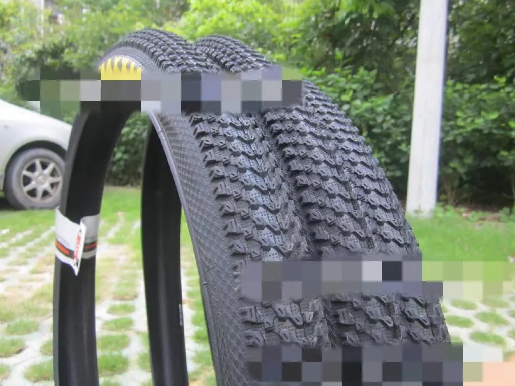 Ultralight puncture-proof mountain bike tyre showing tread pattern, available for 26, 27.5 and 29 inch wheels