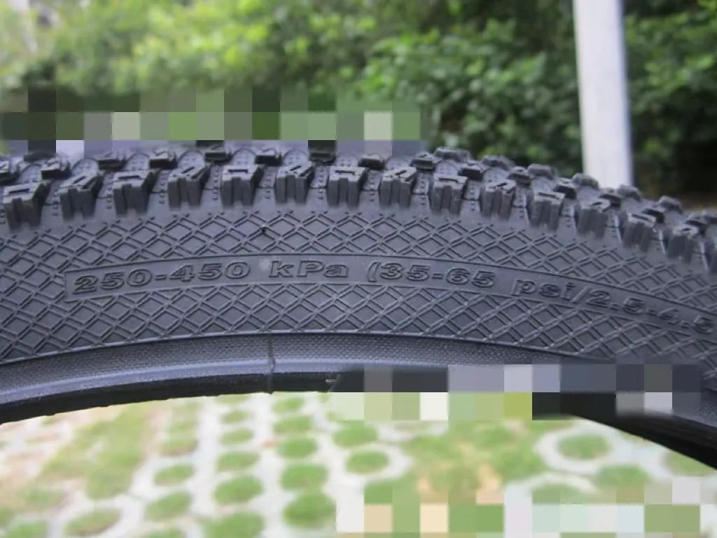 Ultralight puncture-proof mountain bike tyre showing tread pattern, available for 26, 27.5 and 29 inch wheels