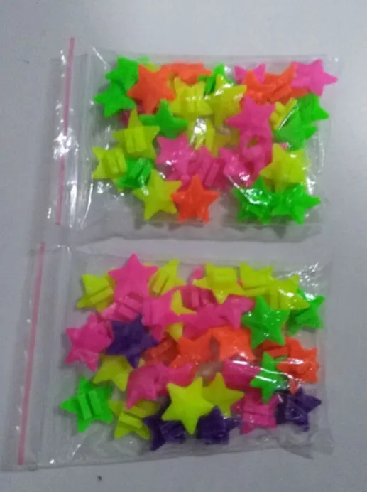 Bag of mixed colour children's bicycle decorations made of plastic or resin for outdoor cycling