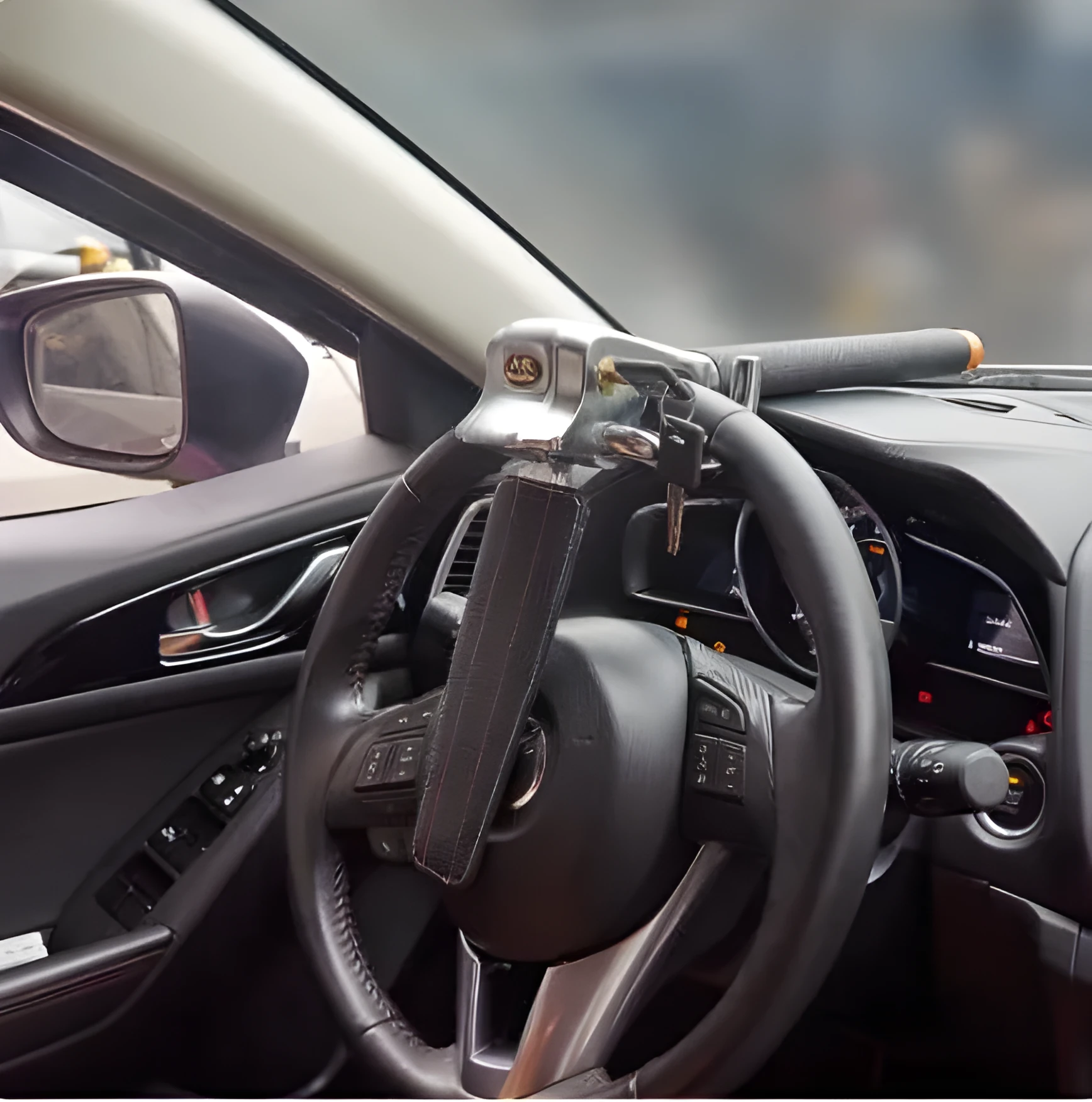 Black car steering wheel lock with alarm, alloy body and artificial leather handle, folded for storage