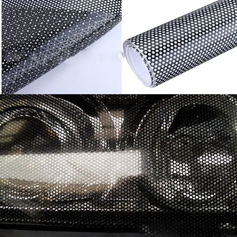 Large sheet of perforated mesh-style automotive vinyl film for car body colour modification.