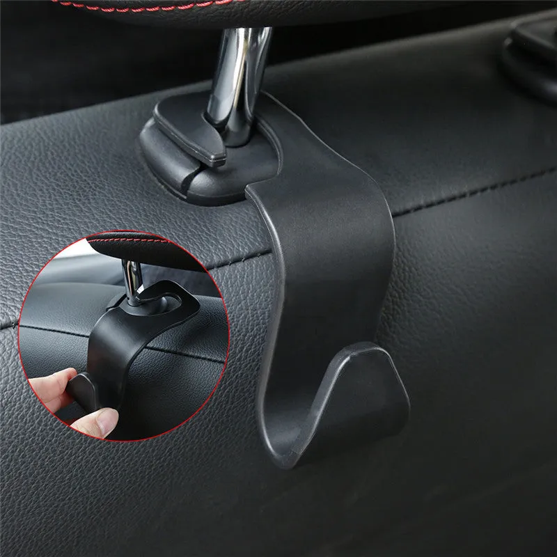 Set of 4 black PP universal car seat back hooks, each 11cm x 3.5cm, with 20kg weight capacity, for hanging bags from car front seat backs