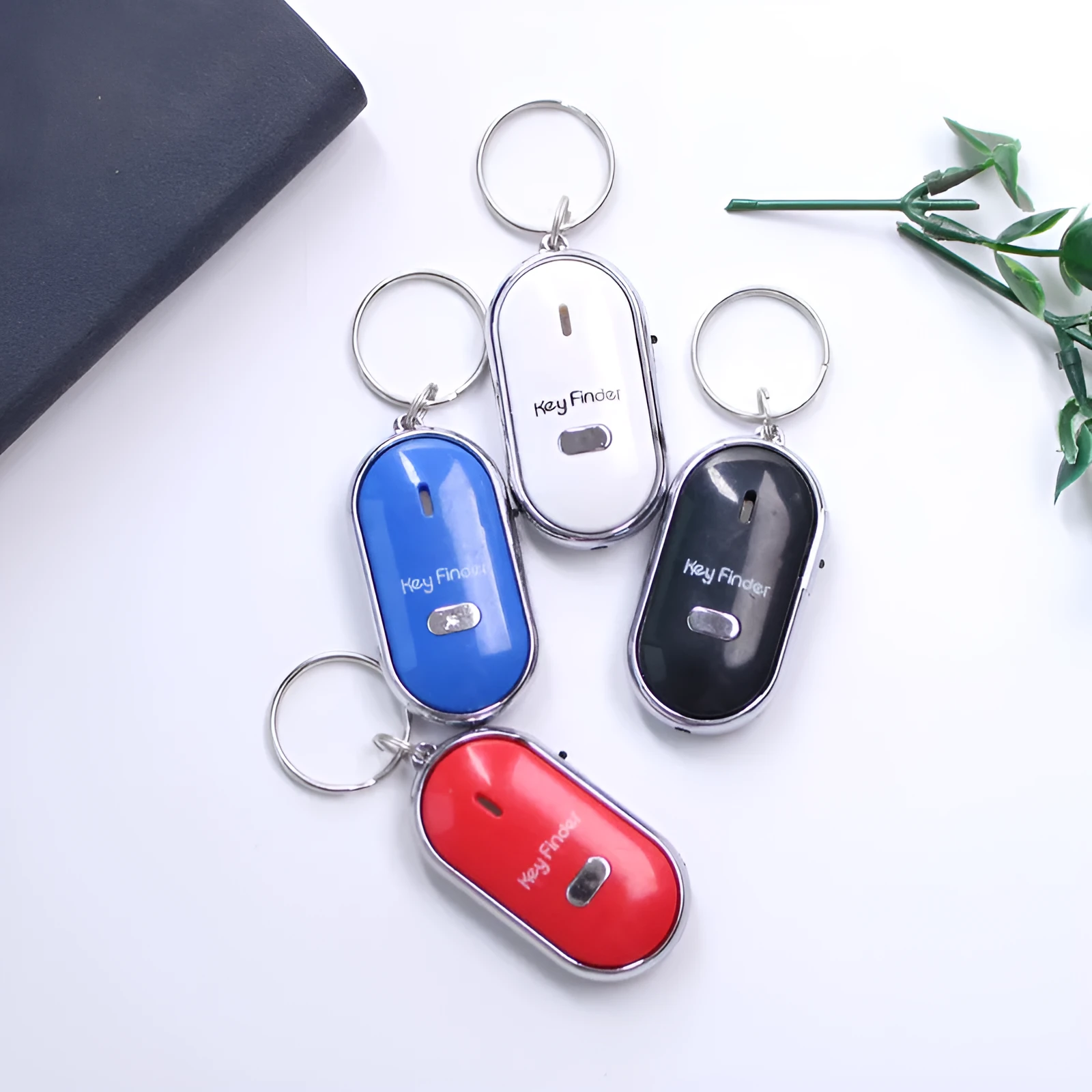 Plastic LED whistle control induction key ring key finder in compact 2.5cm x 8cm size for anti-lost use