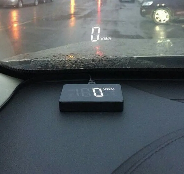 A100 OBD II head up display projecting vehicle speed on windscreen, with white or green light option