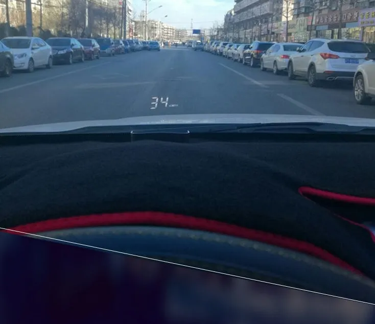 A100 OBD II head up display projecting vehicle speed on windscreen, with white or green light option