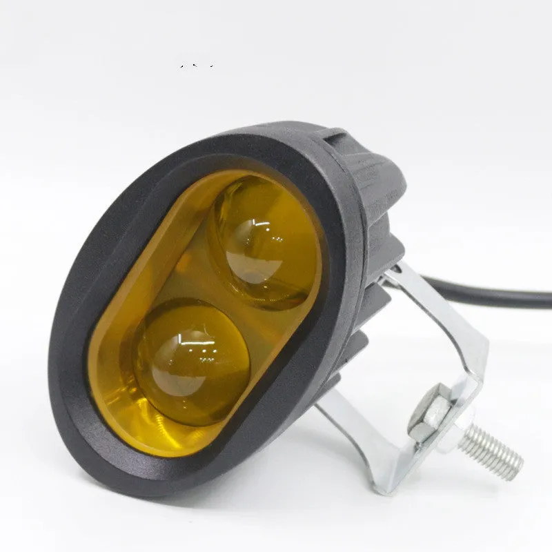 Direct selling motorcycle LED spotlight with aluminium housing in white and yellow light options on dark background