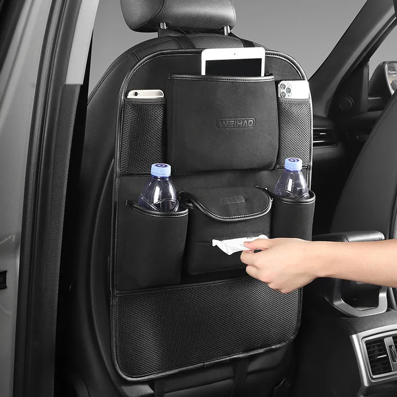 Car seat back storage bag in fleece microfiber, 23.5cm by 13cm, black colour, placed on car seat