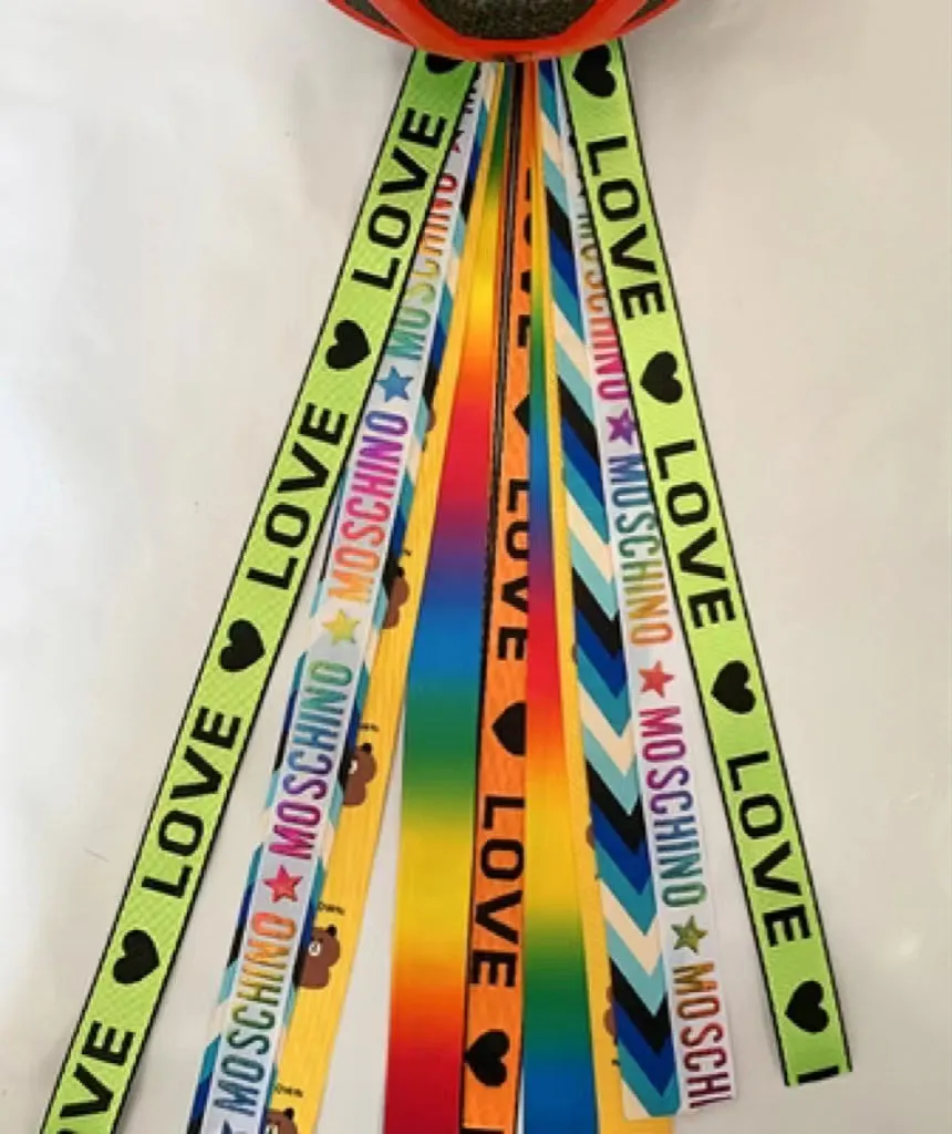 Children's helmet decorative streamer with elastic loop attachment in multiple colour options