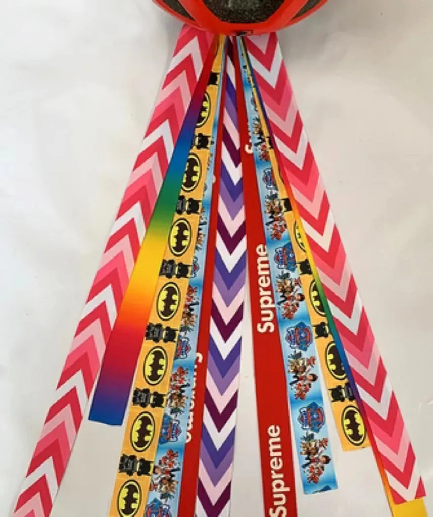 Children's helmet decorative streamer with elastic loop attachment in multiple colour options