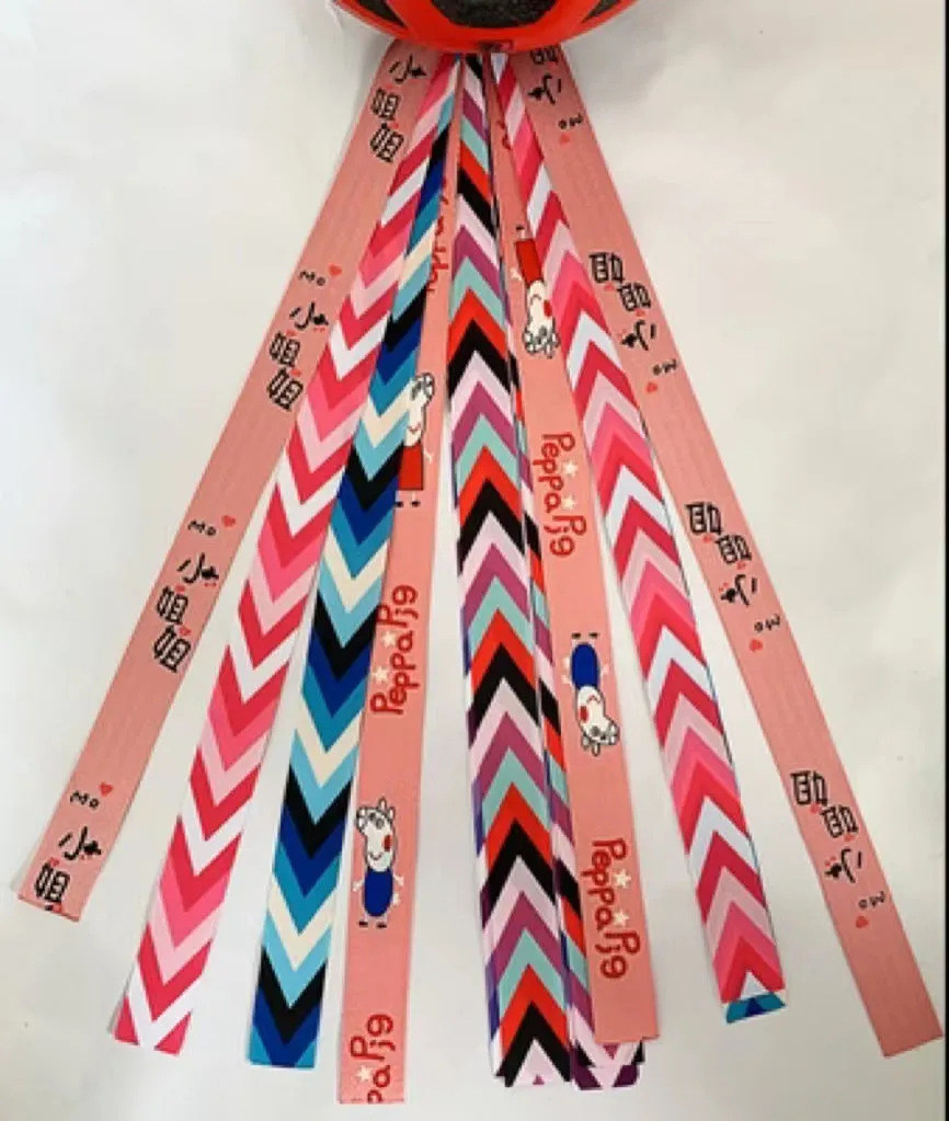 Children's helmet decorative streamer with elastic loop attachment in multiple colour options