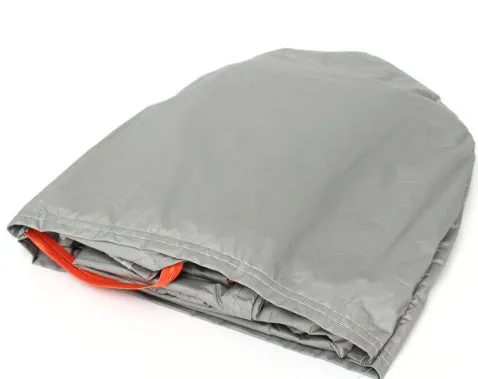 Gray magnetic car windshield cover for sun, snow, frost, and ice protection on a car
