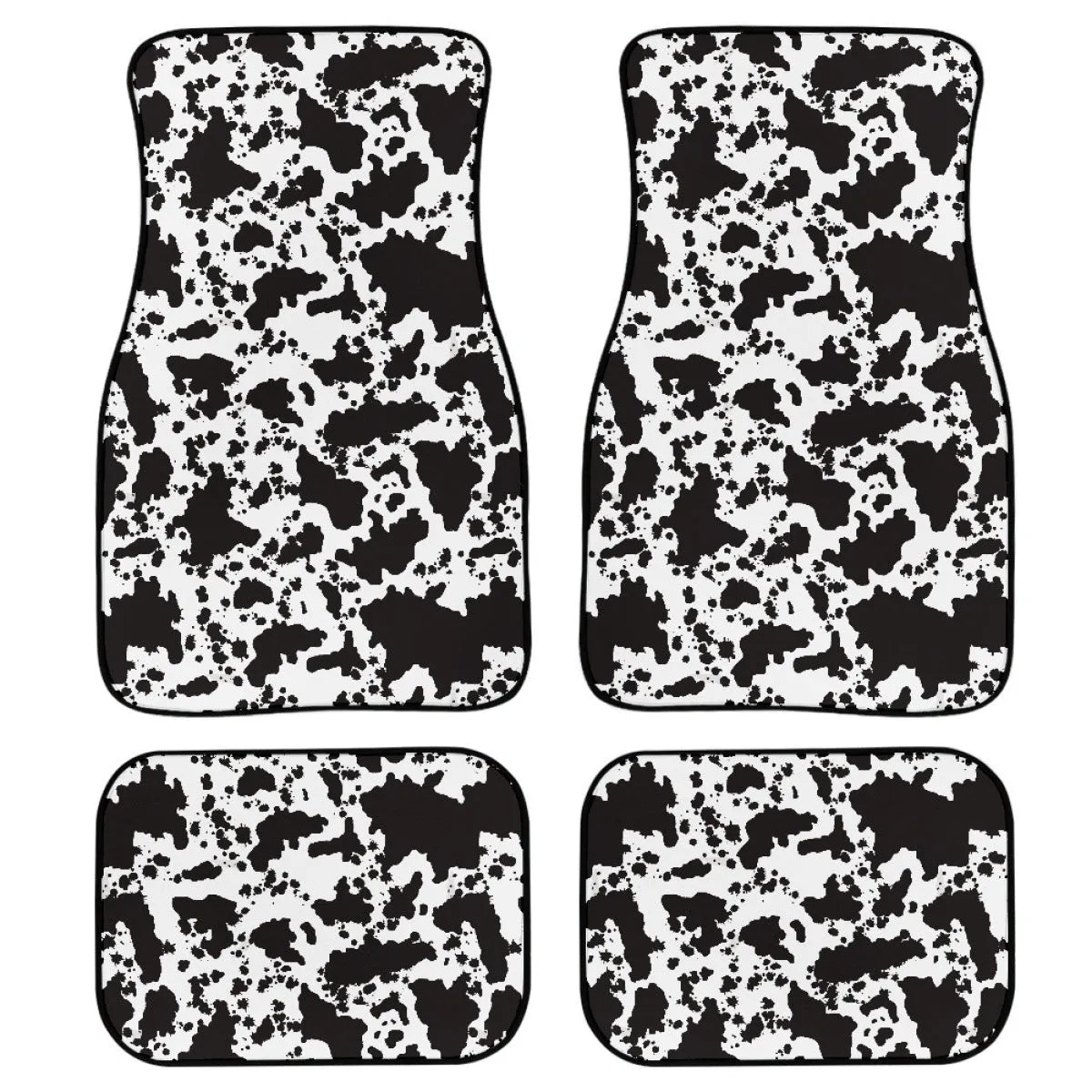 Black four-piece rubber car foot mat set with textured surface, shown on a car floor.