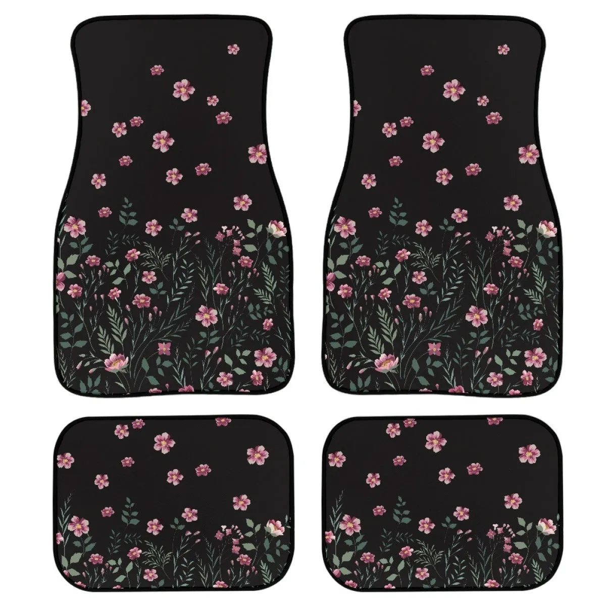 Black four-piece rubber car foot mat set with textured surface, shown on a car floor.