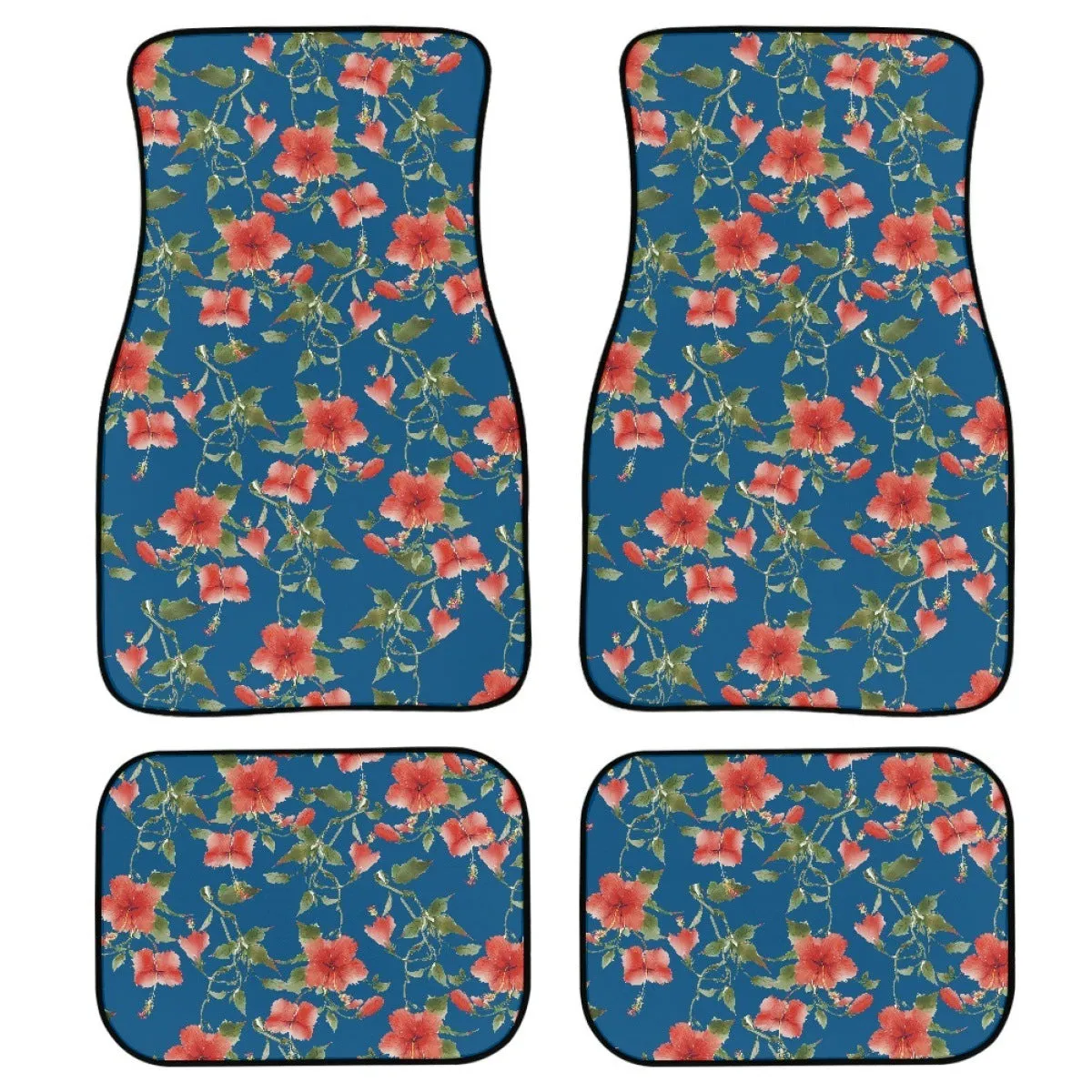 Black four-piece rubber car foot mat set with textured surface, shown on a car floor.