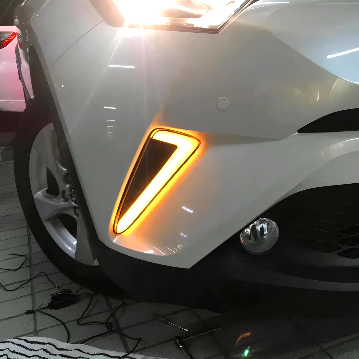 LED daytime running lights fog lights modified yellow light steering for 17 Toyota C-HR close up