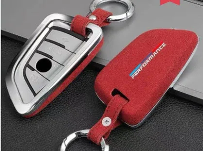 Suede key case with zinc alloy front frame in Classic Black, Charming Red, and Saddle Brown colour options
