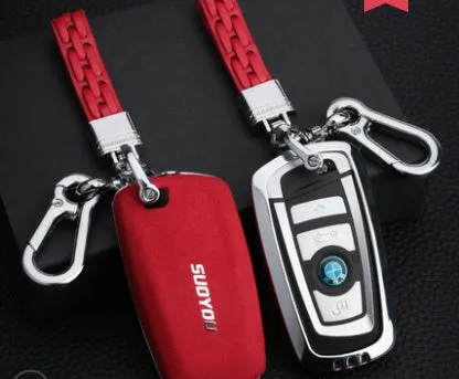 Suede key case with zinc alloy front frame in Classic Black, Charming Red, and Saddle Brown colour options