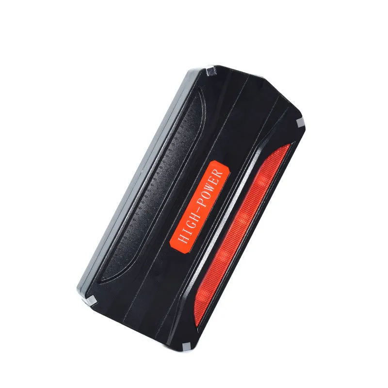 Black and red portable vehicle jump starter power supply unit with 7800mAh capacity.