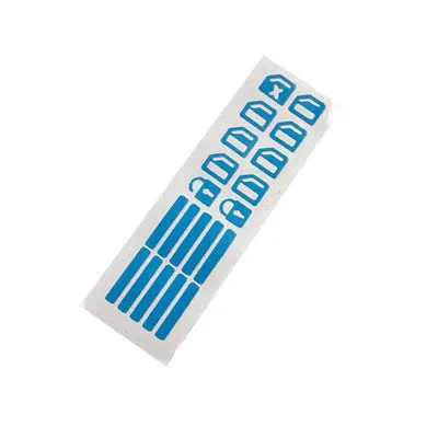 Car window luminous key sticker in blue, green, and orange colours on a window button interior