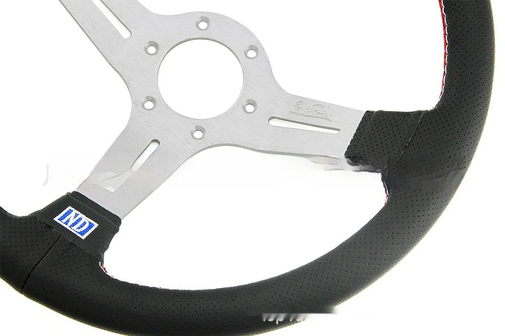 14-inch leather steering wheel with concave middle section, showing black leather and silver skeleton option.