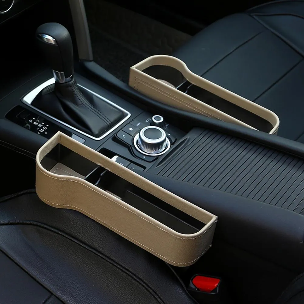 PU leather car seat gap storage box in black, showing phone and cup storage between seat and console