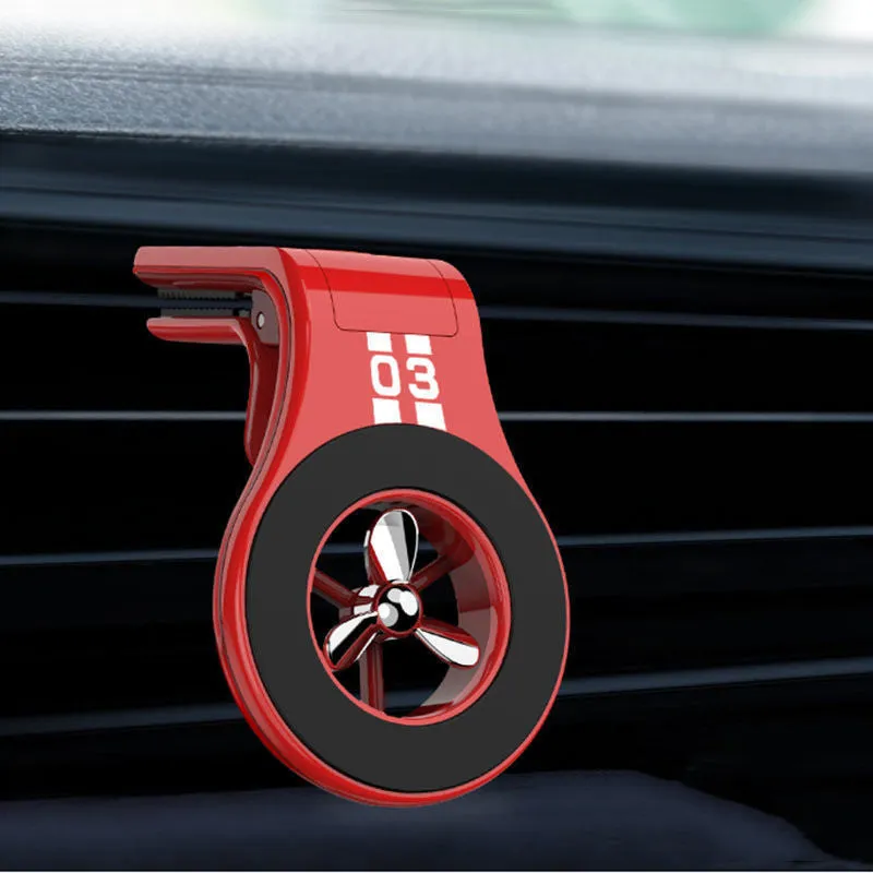 Magnetic car air vent phone holder with perfume diffuser in black, showing 360-degree rotation