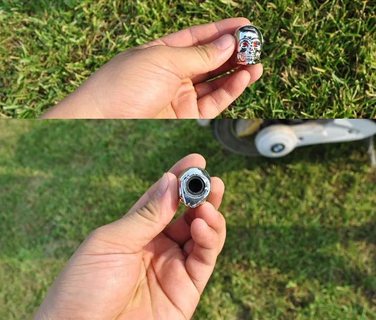 Black rubber tubeless car valve cover on a tyre valve stem