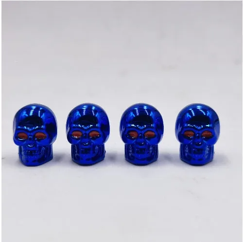 Black rubber tubeless car valve cover on a tyre valve stem