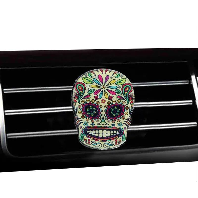Skull-shaped acrylic car air freshener vent clip with mixed fragrance, 3.5-4.5 cm, colour option shown.
